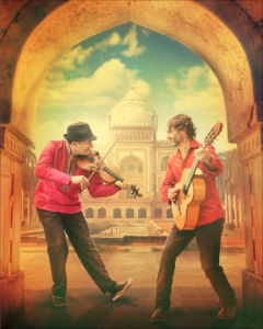 Two White men lean towards each other as they play violin and flamenco guitar in front of a backdrop of the Taj Mahal. / Deux hommes Blancs se penchent l’un vers l’autre en jouant du violon et de la guitare flamenca devant une toile de fond du Taj Mahal.
