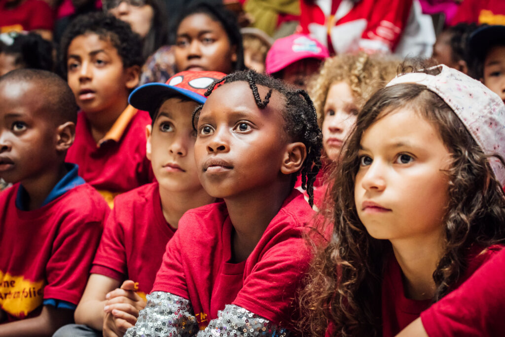 group of children watching a show